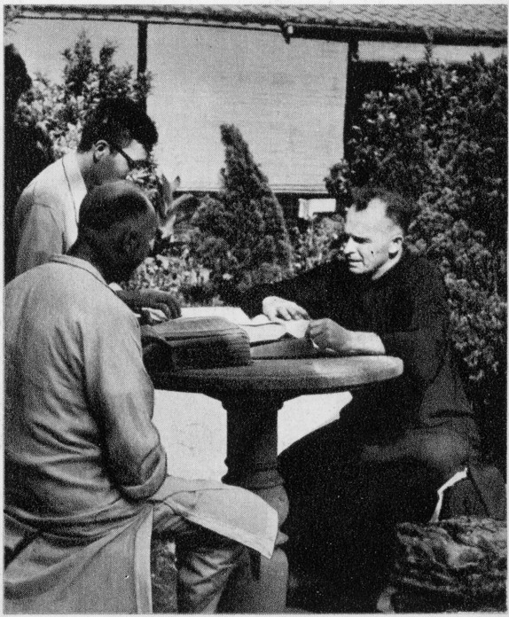 Reading dictionaries in the garden in Taichung.